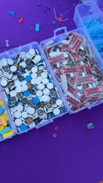 Disco ball and BeatBox carton charms.