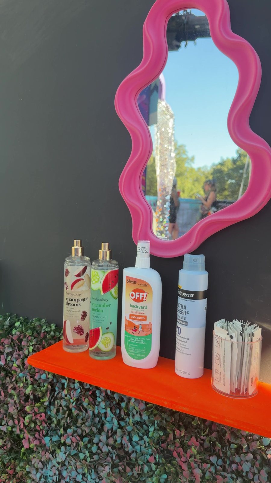 The mirror station, stocked with sunscreen.