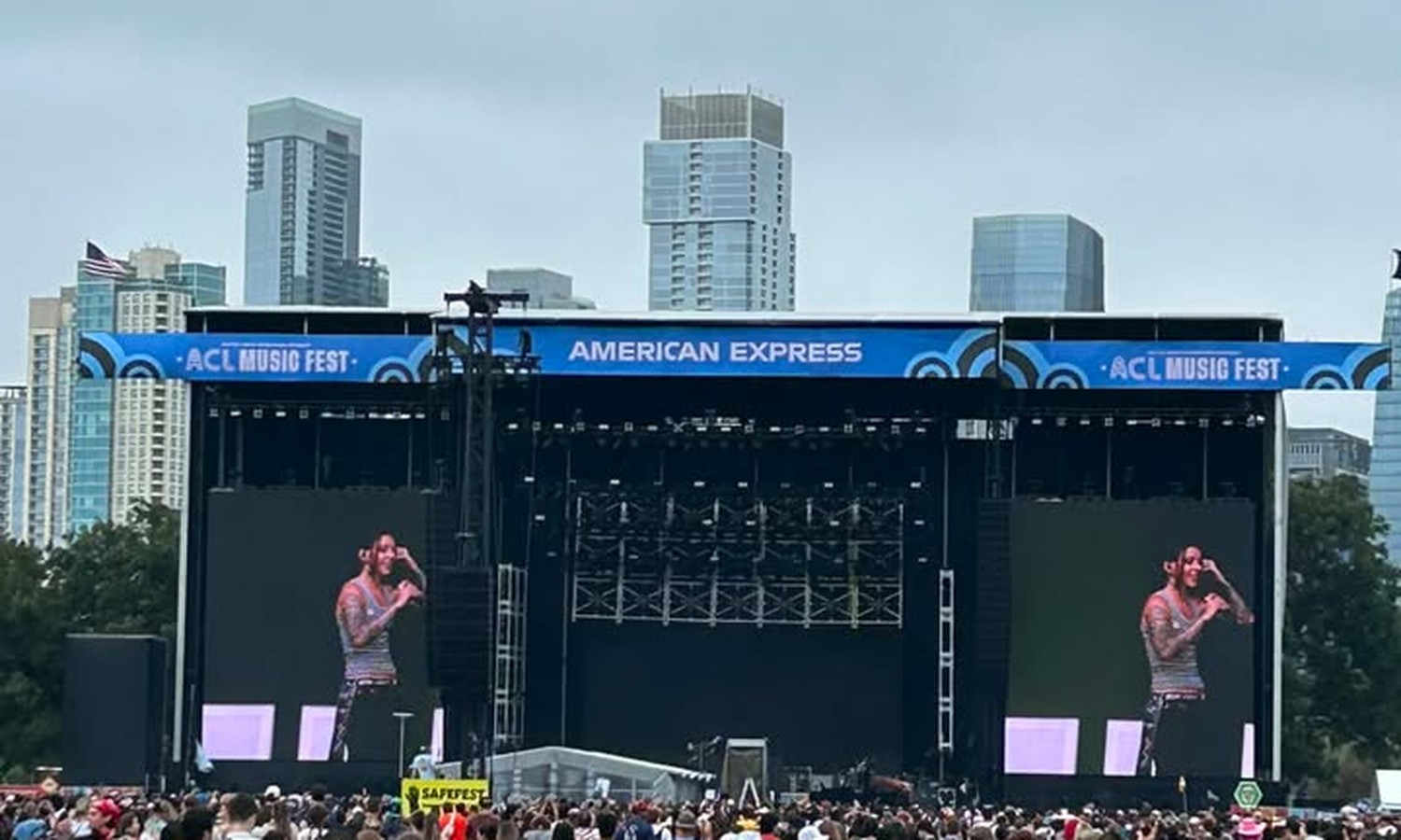 American Express, with the downtown skyline behind the stage.