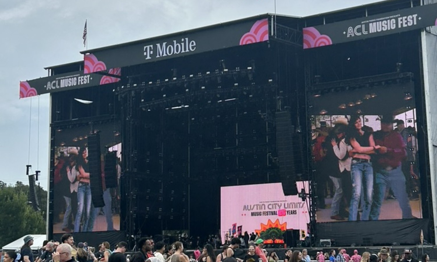 T-Mobile, with the Texas flag flying over it.