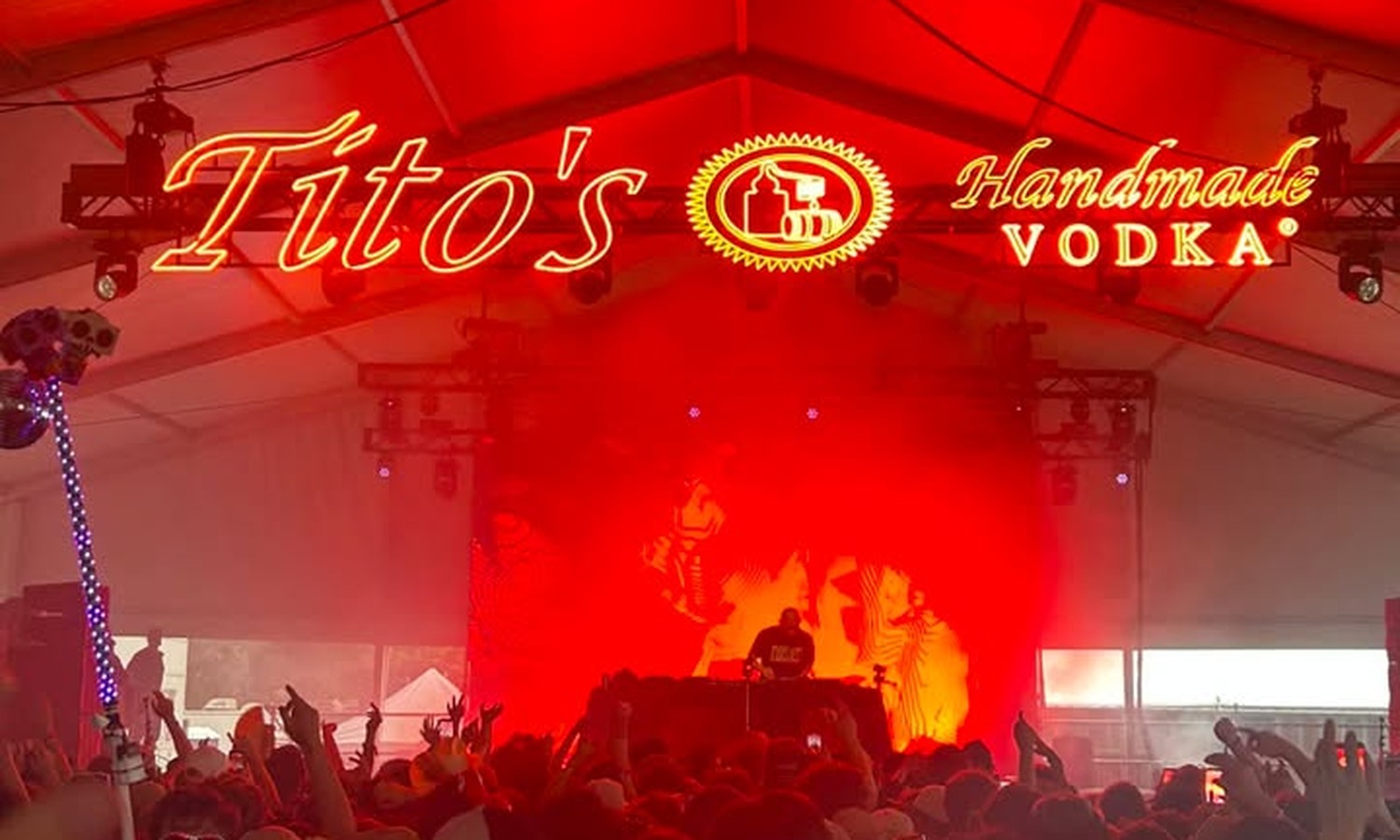 The Tito's tent at full capacity for a DJ set.