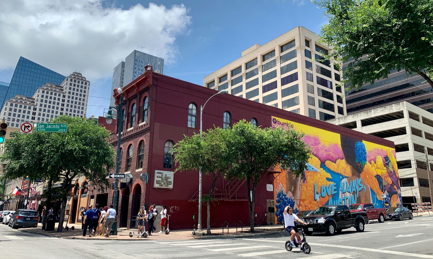 Downtown on 6th Street, a few blocks from the Mercedes Fan Hub at 400 Congress. Photo: Ferdi Pasion / Unsplash