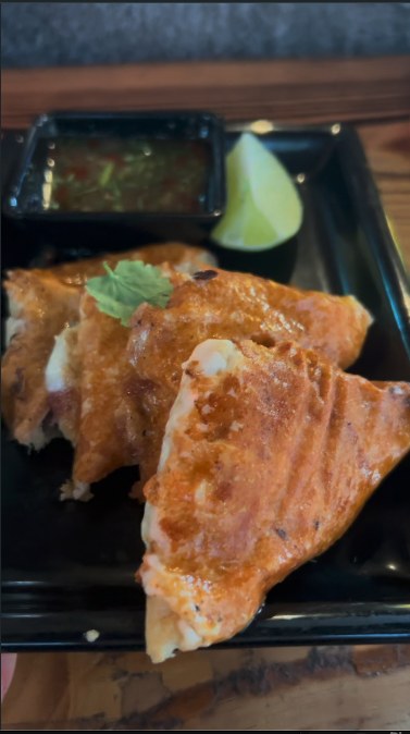 Hot Pocketz — three to an order, with the birria dip and a lime