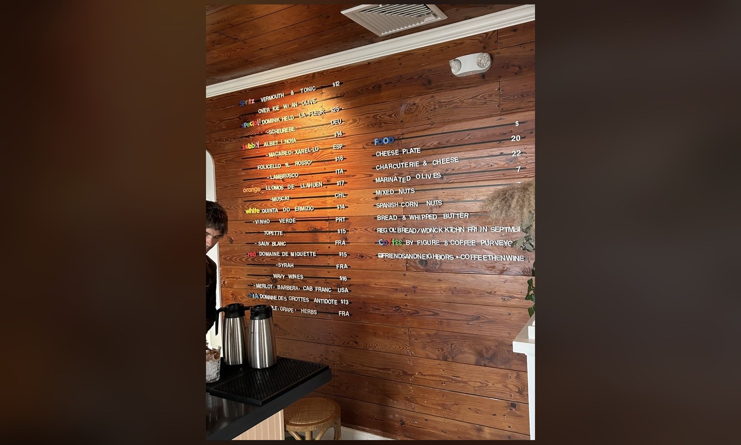 The evening menu, painted on the paneling. Spritz at the top, non-alcoholic at the bottom
